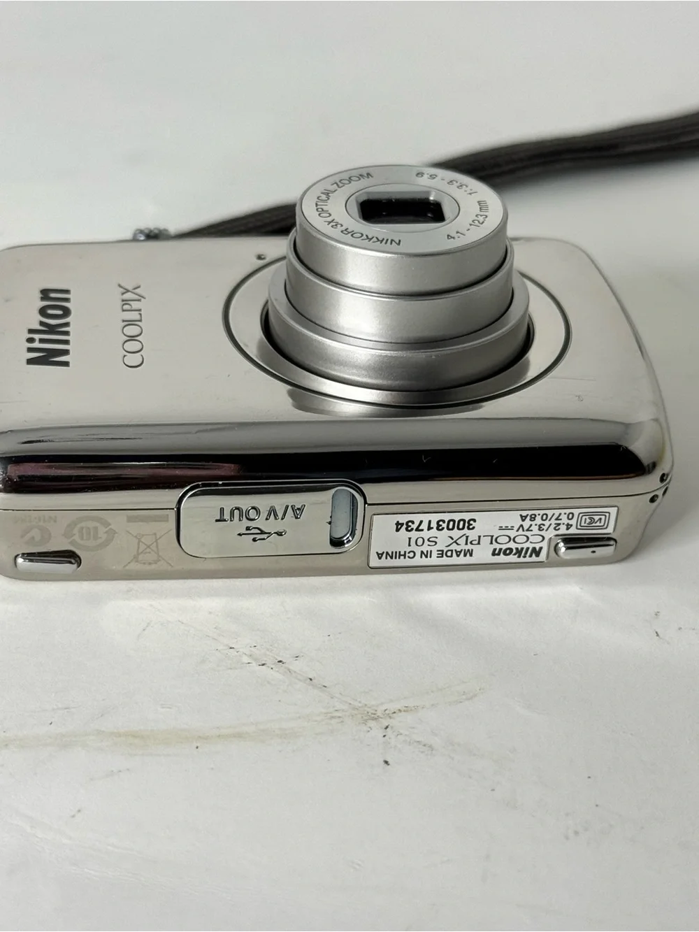 Nikon COOLPIX Silver Point-and-Shoot Camera with Black Case with charger cable